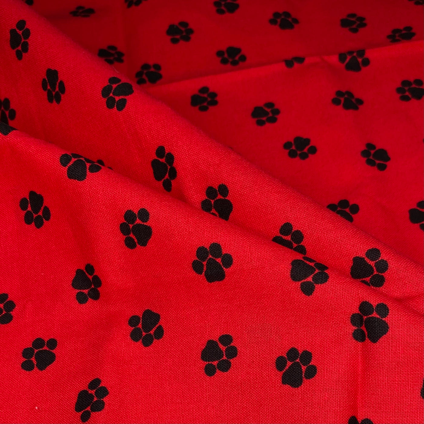 Quilting Cotton - Paw Prints - Red/Black - Remnant